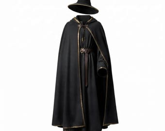 May include: A black hooded cloak with gold trim, a brown leather belt with a buckle, and a matching black pointed hat with gold trim. The ensemble includes a long, flowing robe that reaches the floor, paired with dark brown leather boots.