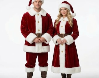 May include: A red velvet Santa Claus costume set consisting of a jacket with white faux fur trim, matching trousers, and a hat. A second red velvet Santa costume features a long coat with white faux fur trim, a matching hat, and brown boots.