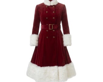 May include: A deep red velvet coat featuring a double-breasted front with gold-toned buttons, a matching waist belt with a rectangular buckle, and white faux fur trim on the high collar, sleeve cuffs, and the flared hemline.
