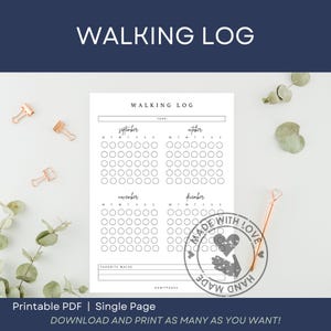 May include: A printable walking log, titled "WALKING LOG", with sections for September, October, November, and December. The log is designed for tracking walks, with space for each day. The image also includes decorative elements like paper clips and a pen.