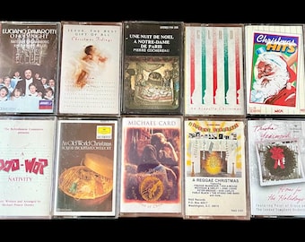 May include: A collection of ten vintage cassette tapes featuring Christmas music and other genres. The tapes have various album art, including images of Santa Claus, angels, and musical artists. The tapes are in their original cases.