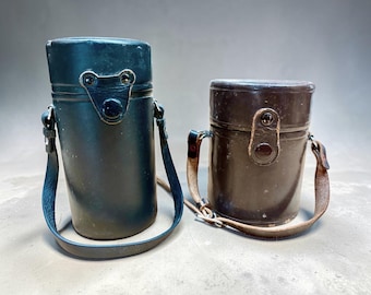 Pair of Vintage Leather Cylindrical Camera Lens Hard Cases: 6" Olympus and 4.5" Nikkor