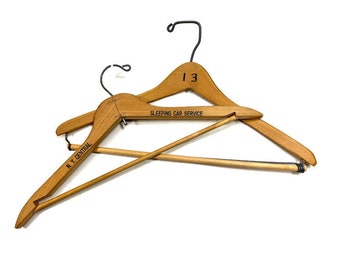 2 Wood Hangers, NY Central Sleeping Car Service