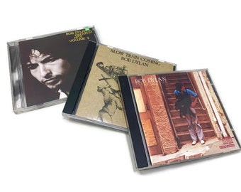 3 Vintage Bob Dylan CDs, "Street Legal," "Slow Train Coming," & "Greatest Hits Volume 3"