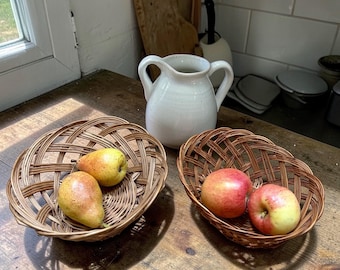 2 Vintage Round and Oval Braided Wicker Fruit or Bread Serving Baskets