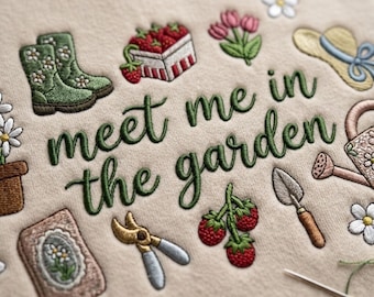 May include: A beige sweatshirt featuring dark green embroidered text that reads meet me in the garden. The design includes embroidered motifs of green boots, a basket of strawberries, pink tulips, a straw hat, a trowel, shears, and flowers.