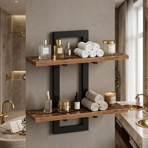 May include: A two-tier wall-mounted shelf featuring a black metal rectangular frame and two horizontal wooden shelves with a dark brown wood grain finish. The shelves hold glass perfume bottles, small jars, rolled white towels, and candles.