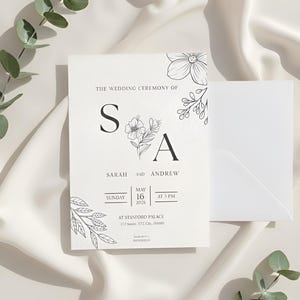 Pode incluir: Um modelo de convite de casamento minimalista com ilustrações florais. O convite inclui os nomes Sarah e Andrew, a data de 16 de maio de 2026 e a hora 15:00. O texto "DIY Floral Art" e os tamanhos 5x7 e A5 também estão incluídos.