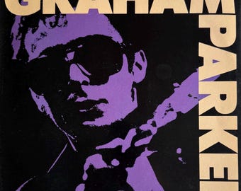 Vintage 1985 GRAHAM PARKER "Pourin' It All Out: The Mercury Years" vinylalbum. Uitstekende staat.