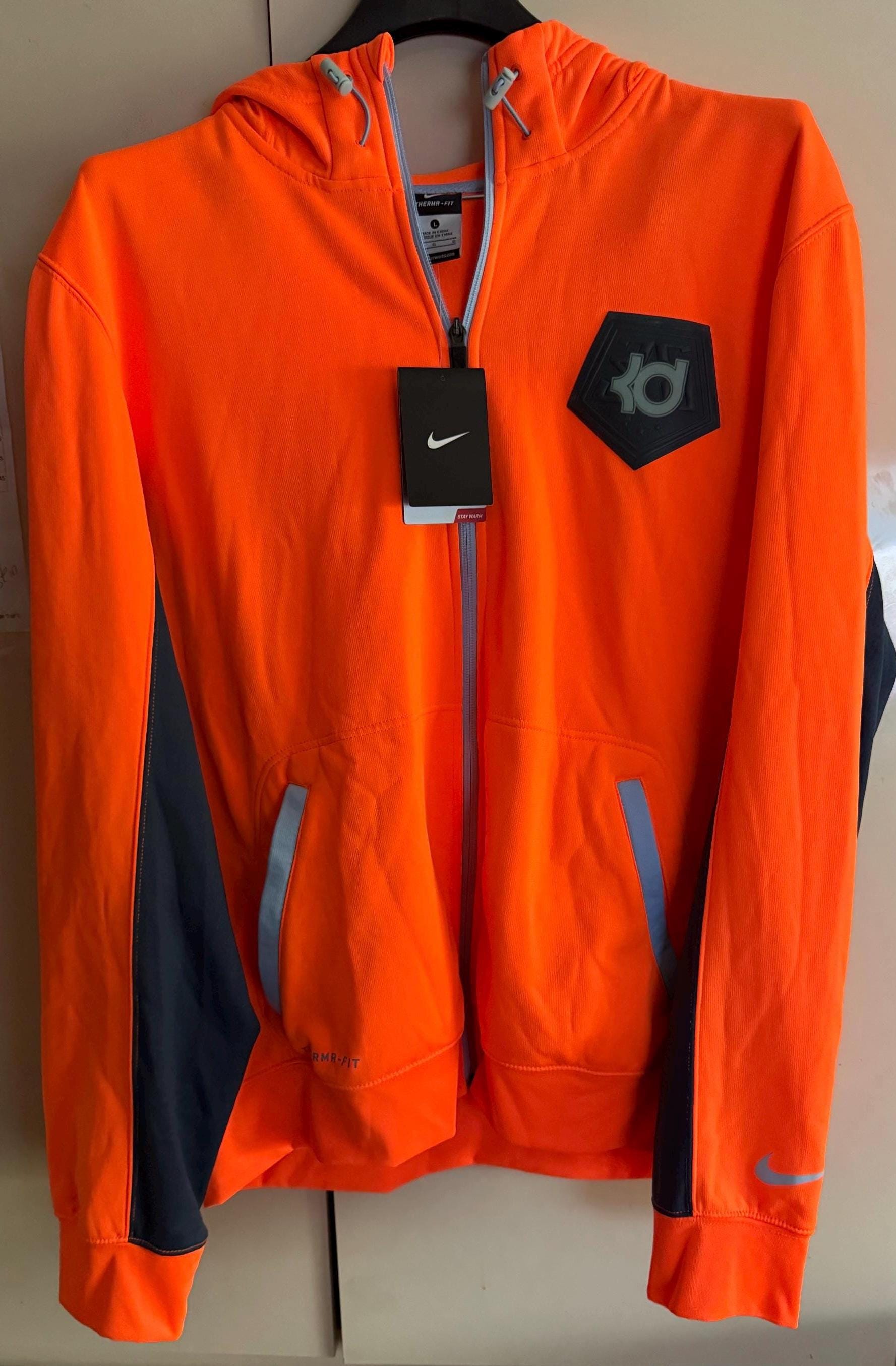 orange nike therma fit hoodie