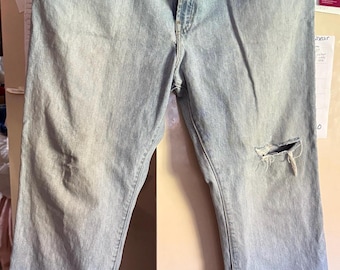 Vintage GAP 1969 distressed/Stonewashed men’s jeans. 38” waist and 30” length. Preowned.