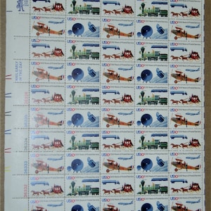 May include: A sheet of 36 US postage stamps commemorating 200 years of postal service. The stamps feature various modes of transportation including a stagecoach, train, aeroplane, and satellite dish. Each stamp has the text "US10c 200 Years of Postal Service".