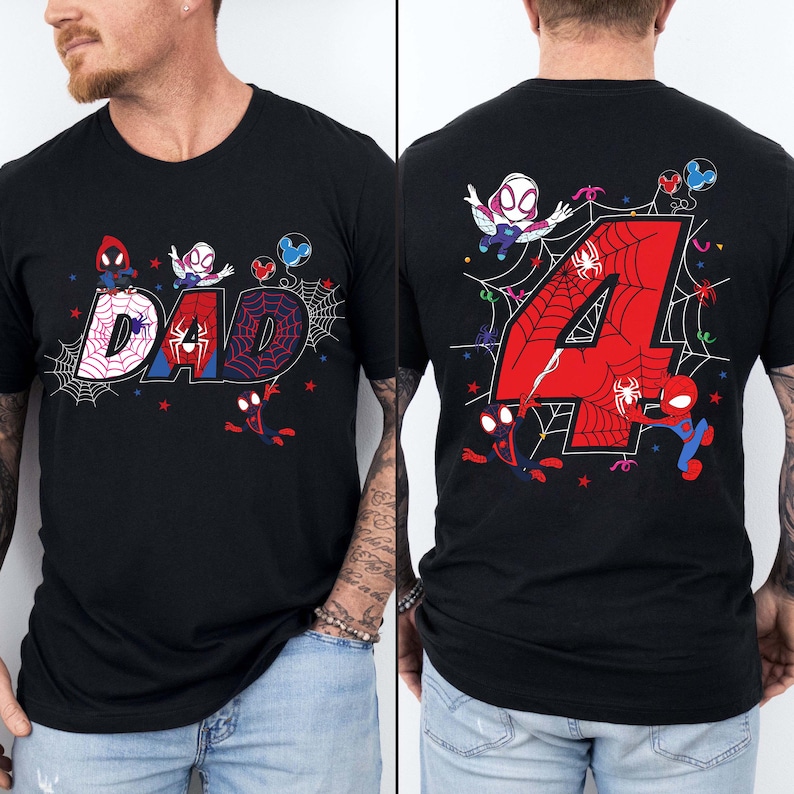 May include: Black t-shirt with a colorful graphic featuring the word "DAD" in a web design, and Spider-Man characters. The back of the shirt displays a large red number "4" with a web design and Spider-Man characters.