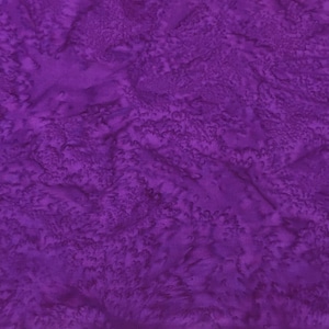 May include: Purple fabric with a textured, marbled pattern. The fabric has a subtle sheen and a soft, smooth feel.