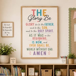 May include: A large framed wall art print featuring the Glory Be prayer in colourful typography. The text reads: THE Glory Be, GLORY be to the FATHER, and to the SON, and to the HOLY SPIRIT. AS IT WAS in the BEGINNING, IS NOW, and EVER SHALL BE, WORLD WITHOUT END. AMEN.