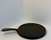 9 inch 8 flat cast iron Skillet from late 1890-1920 s Found with other Wagner marked cast iron skillets.