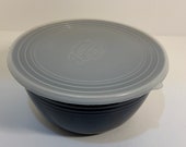 Fiestaware Metal 2 Quart Cobalt Mixing Bowl with cracked lid. Lid fits tight still.
