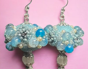Ocean breeze colors of this unique earring made with felted wool and glass Czech beads