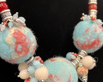 Ocean Blue and Red Sand beach Neclace from felted wool and  Jasper. Silver tone embellishments highlight the moning sunrise feel of this one
