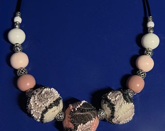 Coral and Black Beautiful wet felted nuno and beaded necklace. One of the kind handmade. It will give your image unique vibe and glamour.