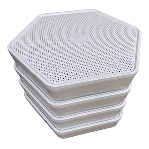 May include: A stack of four white, hexagonal containers. Each container has a perforated lid and a solid base. The top lid has the word "HALO" printed on it. The containers are designed to be stacked.