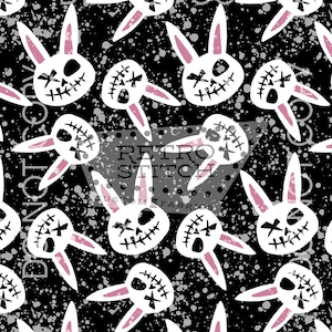 May include: Black fabric with a repeating pattern of white bunny skulls with pink ears. The bunny skulls have stitched mouths and cross-shaped eyes. White paint splatters are scattered across the black background. The words "Retro Stitch Custom Fabrics" are visible.