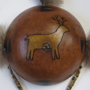 Handmade Deer Totem Gourd Shield: Pyrography Art with Turkey Feathers