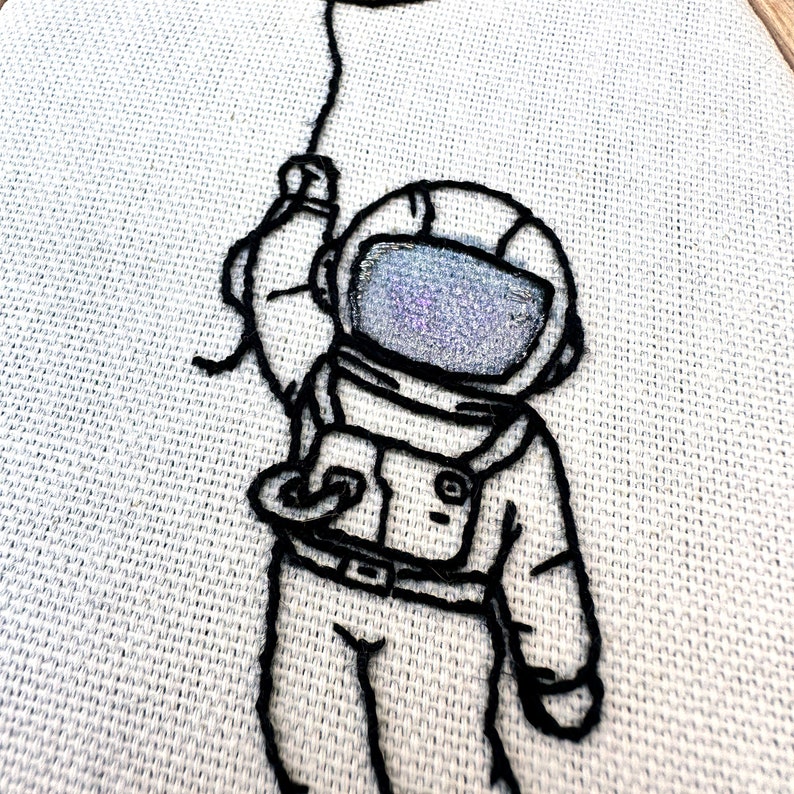 Little Astronaut hanging on to a planet Finished water color hand embroidery wall art small size image 2