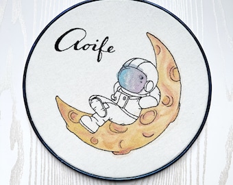 Custom baby name astronaut hanging out on the moon hand embroidery water color wall art