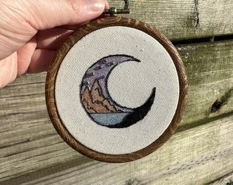 Dreams of Adventure,  4 inch hand embroidered wall art, colored with metallic water color and beading