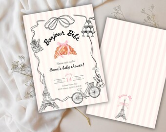 May include: Baby shower invitation with a Parisian theme. The invitation features a pink and white striped background with black line art of the Eiffel Tower, a bicycle, and a croissant. The text "Bonjour Bébé" is displayed at the top.