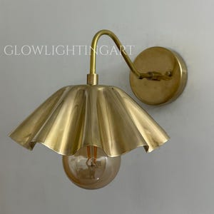 Mid-Century Raw Brass Wall Sconce: Fluted Shade, Hardwired Light