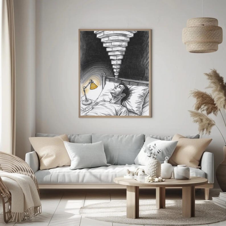 Framed insomnia and anxiety wall art above a light grey sofa in a neutral Scandinavian living room, sketch shows a person lying awake in bed with a yellow bedside lamp and a tunnel of ceiling lights