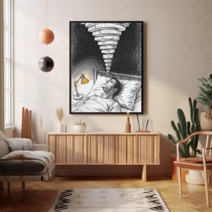Framed mental health insomnia art above a wooden sideboard in a minimalist living room with warm lighting, sketch shows a person awake in bed with a yellow bedside lamp and repeating ceiling lights