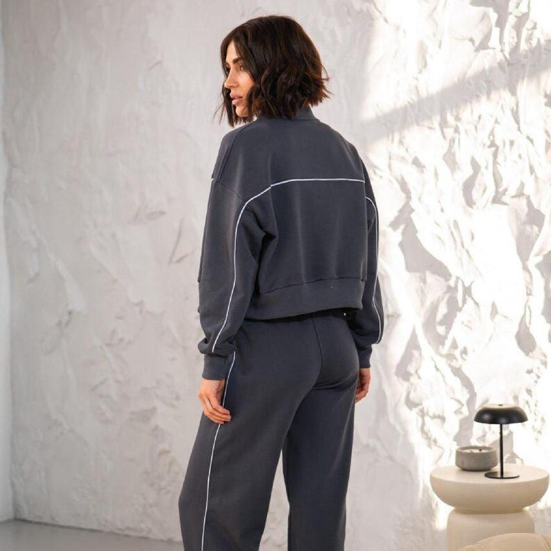 💫Effortless Style with Our Women's Two-Piece Set of Hoodie and Palazzo! 💫

✨Fabric - Peyne (3-thread loop)
90% Сotton, 10% polyester

Set includes: Hoodie and Palazzo pants

Step into the ultimate comfort and style with this versatile women's tracksuit. This isn't just a basic loungewear; it's a chic streetwear women set that's perfect for both relaxed days and running errands. This beautiful two-piece women set doubles as a cozy outfit and a fashionable statement piece.