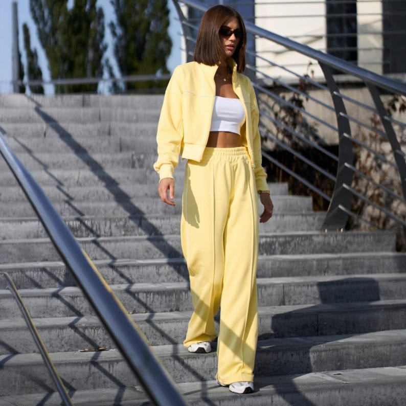 💫Effortless Style with Our Women's Two-Piece Set of Hoodie and Palazzo! 💫

✨Fabric - Peyne (3-thread loop)
90% Сotton, 10% polyester

Set includes: Hoodie and Palazzo pants

Step into the ultimate comfort and style with this versatile women's tracksuit. This isn't just a basic loungewear; it's a chic streetwear women set that's perfect for both relaxed days and running errands. This beautiful two-piece women set doubles as a cozy outfit and a fashionable statement piece.