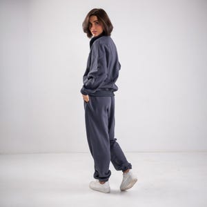 ✨Fabric - Peyne (3-thread loop)
90% Cotton, 10% Polyester
Does not pill, does not fade

📏Sizes: S, M, L, XL (please refer to the last photo for detailed measurements)

Set includes: Hoodie and Joggers

Step into ultimate comfort and style with this versatile women's tracksuit. This isn't just a set for lounging; it's a chic streetwear women set that's perfect for your everyday adventures.