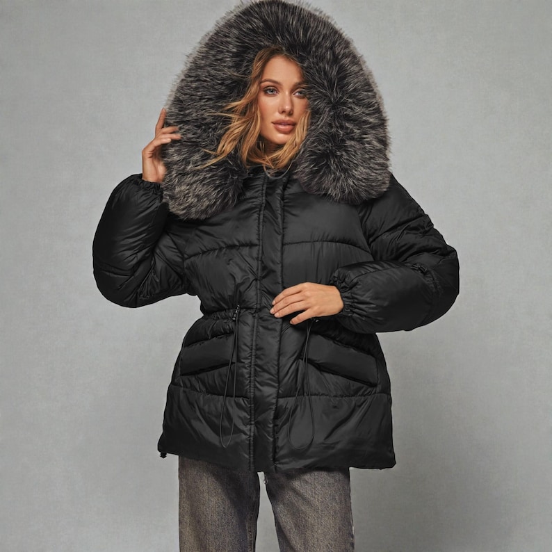 This premium winter collection features water-repellent polyester coats designed for extreme cold. Models include a quilted maxi jacket rated for -15°C with silicone 200 and bio-down puffers handling temperatures down to -20°C. Features include non-removable hoods, detachable fur, and adjustable drawstrings for a custom silhouette. Functional pockets and zip-and-button closures ensure a cozy winter outlook. Stay warm! ❄️🧥