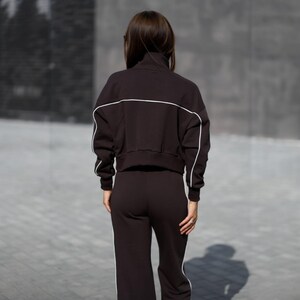 💫Effortless Style with Our Women's Two-Piece Set of Hoodie and Palazzo! 💫

✨Fabric - Peyne (3-thread loop)
90% Сotton, 10% polyester

Set includes: Hoodie and Palazzo pants

Step into the ultimate comfort and style with this versatile women's tracksuit. This isn't just a basic loungewear; it's a chic streetwear women set that's perfect for both relaxed days and running errands. This beautiful two-piece women set doubles as a cozy outfit and a fashionable statement piece.