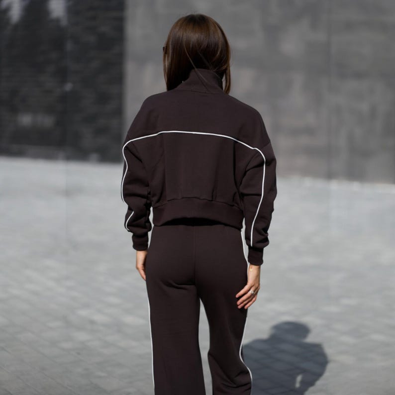 💫Effortless Style with Our Women's Two-Piece Set of Hoodie and Palazzo! 💫

✨Fabric - Peyne (3-thread loop)
90% Сotton, 10% polyester

Set includes: Hoodie and Palazzo pants

Step into the ultimate comfort and style with this versatile women's tracksuit. This isn't just a basic loungewear; it's a chic streetwear women set that's perfect for both relaxed days and running errands. This beautiful two-piece women set doubles as a cozy outfit and a fashionable statement piece.