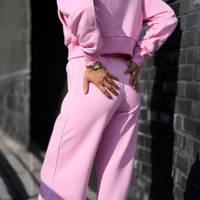 💫Effortless Style with Our Women's Two-Piece Set of Hoodie and Palazzo! 💫

✨Fabric - Peyne (3-thread loop)
90% Сotton, 10% polyester

Set includes: Hoodie and Palazzo pants

Step into the ultimate comfort and style with this versatile women's tracksuit. This isn't just a basic loungewear; it's a chic streetwear women set that's perfect for both relaxed days and running errands. This beautiful two-piece women set doubles as a cozy outfit and a fashionable statement piece.