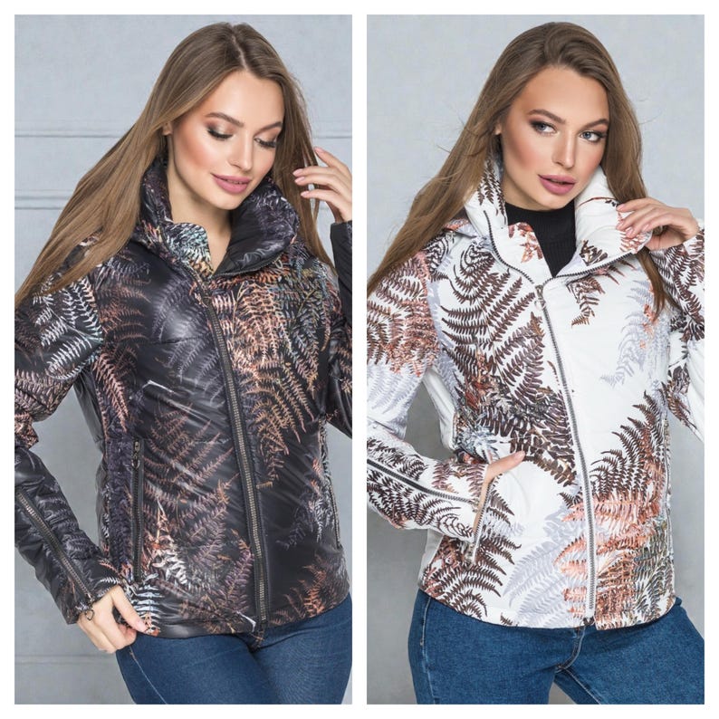 This white puffer jacket blends high-fashion botanical prints with functional design, keeping you comfortable in temperatures down to -5C.

Top Performance Specs
❄️ Insulation: Premium Biosilicone 120 mm for a light down jacket feel.
❄️ Weatherproof: Durable, waterproof raincoat fabric (100% polyester).
❄️ Closure: Unique voluminous diagonal zip puffer coat.
❄️ Collar: High stand-up style for wind protection.
❄️ Utility: Convenient slit pockets and decorative sleeve zippers.