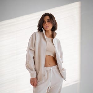 ✨Fabric - Peyne (3-thread loop)
90% Cotton, 10% Polyester
Does not pill, does not fade

📏Sizes: S, M, L, XL (please refer to the last photo for detailed measurements)

Set includes: Hoodie and Joggers

Step into ultimate comfort and style with this versatile women's tracksuit. This isn't just a set for lounging; it's a chic streetwear women set that's perfect for your everyday adventures.