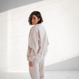 ✨Fabric - Peyne (3-thread loop)
90% Cotton, 10% Polyester
Does not pill, does not fade

📏Sizes: S, M, L, XL (please refer to the last photo for detailed measurements)

Set includes: Hoodie and Joggers

Step into ultimate comfort and style with this versatile women's tracksuit. This isn't just a set for lounging; it's a chic streetwear women set that's perfect for your everyday adventures.