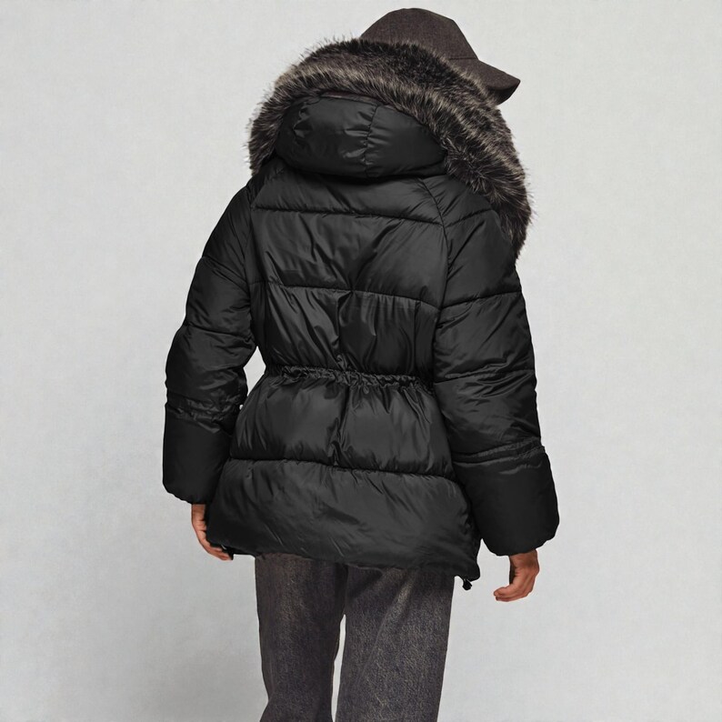 This premium winter collection features water-repellent polyester coats designed for extreme cold. Models include a quilted maxi jacket rated for -15°C with silicone 200 and bio-down puffers handling temperatures down to -20°C. Features include non-removable hoods, detachable fur, and adjustable drawstrings for a custom silhouette. Functional pockets and zip-and-button closures ensure a cozy winter outlook. Stay warm! ❄️🧥