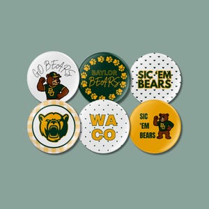 May include: A collection of six round buttons with Baylor University designs. The buttons feature the words "GO BEARS", "BAYLOR BEARS", "SIC 'EM BEARS", and "WACO", along with bear graphics and paw prints. The color scheme includes green, gold, and white.