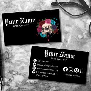 May include: Black business cards with gothic font text reading "Your Name" and "Your Specialty". One card features a skull with colorful roses. The other card includes contact information and social media icons.