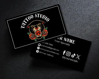 May include: Black business cards with a white border. One card features the text "TATTOO STUDIO" above a panther head with roses. The other card has contact information and social media icons.