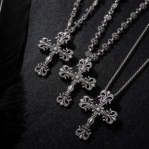 Ornate Gothic Silver Cross Necklaces on Black Velvet