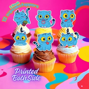 May include: A collection of cupcakes topped with blue cat-shaped cupcake toppers. The toppers are 2.5 inches and printed on both sides. The cupcakes have white and yellow frosting, and chocolate frosting. The background is pink and yellow.